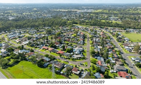 Drone aerial photograph of houses and parklands in the suburb of Werrington County in the greater Sydney region on New South Wales in Australia Royalty-Free Stock Photo #2419486089
