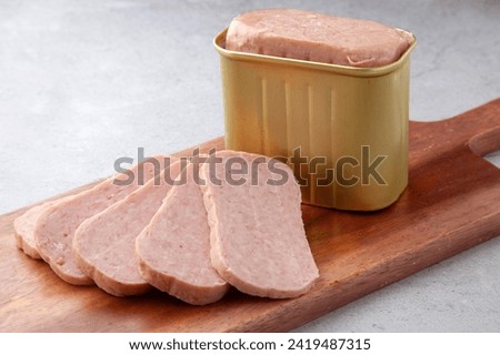 Luncheon meat sliced and served Royalty-Free Stock Photo #2419487315