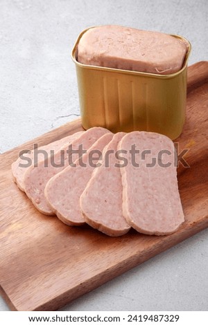 Luncheon meat sliced and served Royalty-Free Stock Photo #2419487329