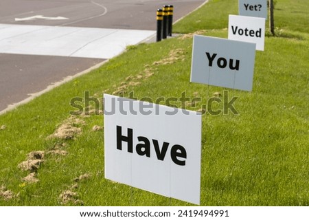 Closeup of "Have You Voted Yet" lawn signs. Election Day concept.
