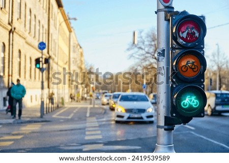 Sustainable transport. Bicycle traffic signal, green light, road bike, free bike zone or area, bike friendly.