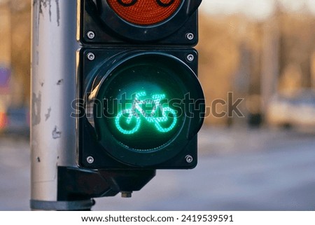 Sustainable transport. Bicycle traffic signal, green light, road bike, free bike zone or area, bike friendly.