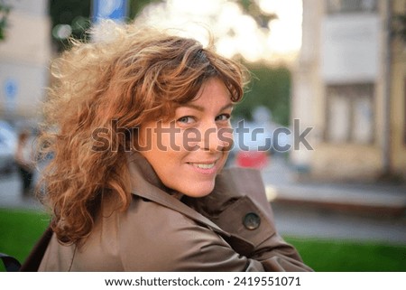 Face, smile and portrait of a woman happy in a park in summer for beauty, excited and confident in nature. garden and female person or model outdoor with freedom, happiness, style. High quality photo