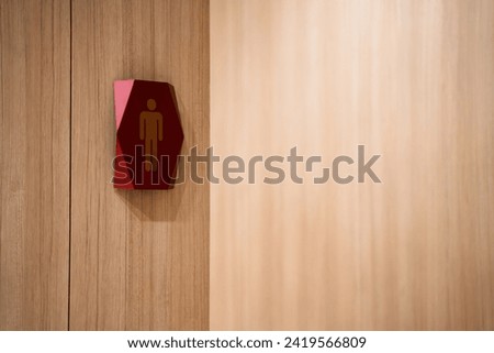 symbol icon men's bathroom icon wooden wall background.