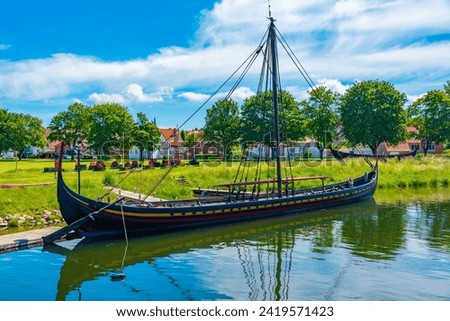 Reconstructed viking ships at the port of Roskilde, Denmark. Royalty-Free Stock Photo #2419571423