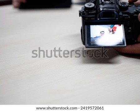 Table desk wooden copy space video camera take a photo film technology lens digital photographer picture  businessman businesswoman work job career cinema media camcorder media television look camera