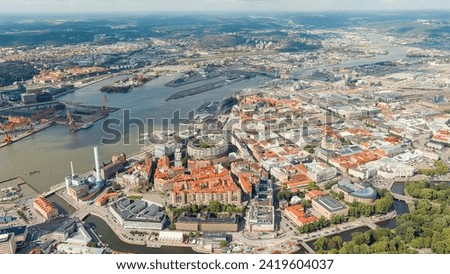 Gothenburg, Sweden. River Gota Alv and Rosenlund Canal. Panoramic view of the central part of the city. Summer day. Cloudy weather, Aerial View   Royalty-Free Stock Photo #2419604037
