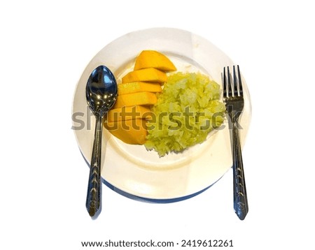 Pictures of dessert from Thailand with mango and sticky rice and put on white background,concept isolated picture style.