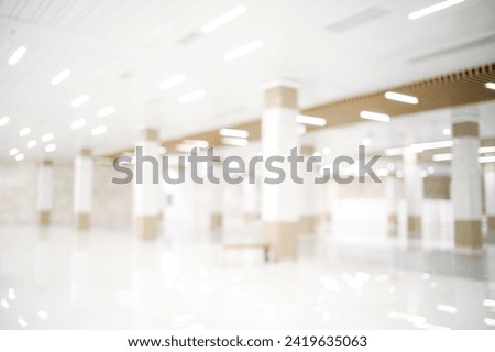 Blurred, defocused background of public hall. Abstract blur exhibition hall event background