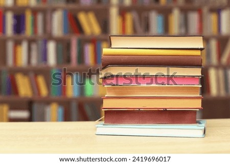 stack of books on the shelf in library. education background