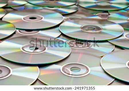 Background of compact disks or dvds Royalty-Free Stock Photo #241971355