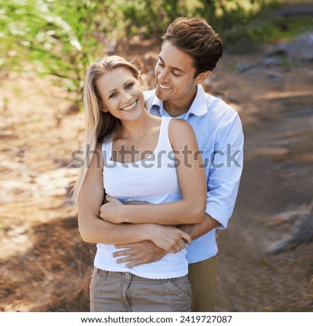 Nature portrait, love and happy couple hug for support, romantic care and relationship security with marriage partner. Embrace, wellness and relax outdoor man, woman or people smile for forest date Royalty-Free Stock Photo #2419727087