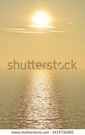 Bright sunset reflection of Sun at Water surface Background. High quality photo