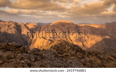 The beautiful Egyptian Sinai Peninsula with yellow sand, desert, plateaus and high and magnificent mountains, which is located on the borders with Palestine and Gaza, which contains the Suez Canal Royalty-Free Stock Photo #2419746881