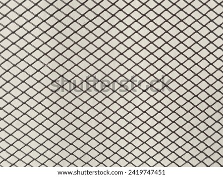 Shiny mesh texture of seamless chrome metal door trellis. Vector background.