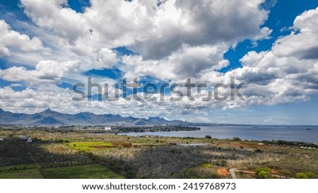 Scenic View of Ocean and Mountains in Mauritius