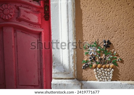 Beautiful art decorations made from shells and pebbles on walls in Ile Penotte, Les Sables d'0lonne of the department of Vendee, Pays de la Loire, France