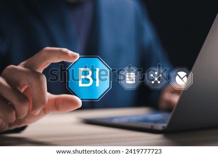 BI, Business Intelligence. Businessman using laptop with virtual screen of BI icon for technology to transform normal data into insights that can be used to help make decisions and analyze results