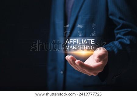 Affiliate marketing. Businessman with virtual screen of affiliate marketing icons for new business concept. Marketing strategies to advertise products and services. Royalty-Free Stock Photo #2419777725