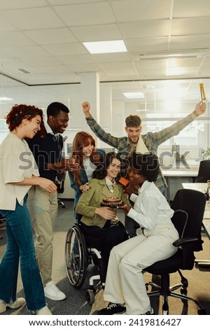 African american business woman celebrating birthday with multiracial coworkers in the office. Making a surprise party for their coworker. Celebrating important date with friends at work. Copy space.