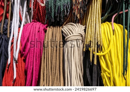 In this photo of shoelaces, you can see the beauty in simplicity. The strong rope texture details and bright colors add to the appeal. 