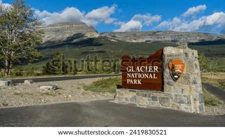 Glacier National Park entrance sign at St Mary Visitor Center in St. Mary, Montana landscape