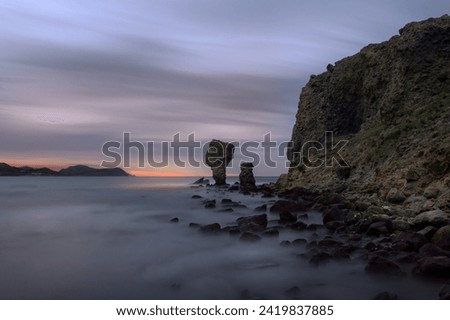 Long exposure photo of Kaspaka beach in Limnos. Clouds and sea moved.