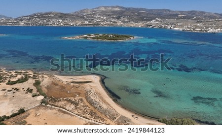 Aerial drone photo of small tropical islet of Revmatonisi near main village and port Antiaparos island, Cyclades, Greece