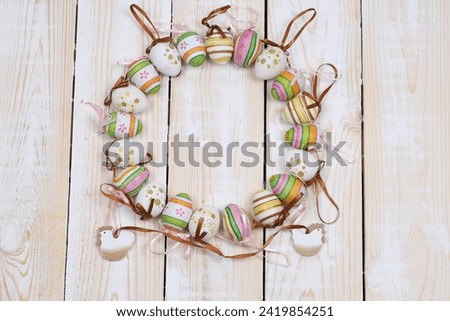 Happy Easter background in the pastel color and on the wood