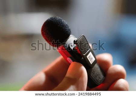 Wireless Mic in Hand With Red Light 