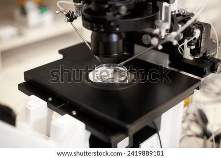 Modern IVF micromanipulator with Petri Dish in the laboratory of the in vitro fertilization. for insemination of the egg freezing. Sperm cryopreservation. Ovum fertilization procedure Royalty-Free Stock Photo #2419889101