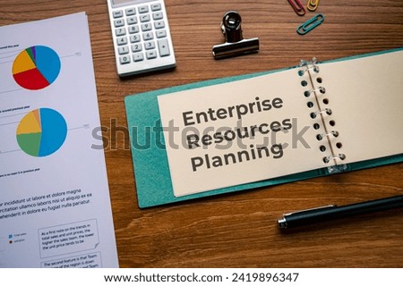 There is notebook with the word Enterprise Resources Planning. It is as an eye-catching image.