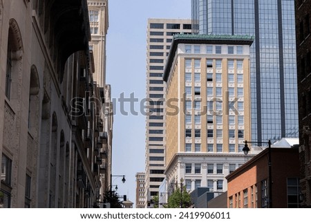 Kansas City, Missouri, USA - June 15, 2023:  Afternoon light shines on historic buildings in downtown Kansas City.