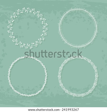 Round handdrawn wreaths on texturized vintage background. Collection of clip art vector bouquets. Romantic wreath with copyspace for your text. 