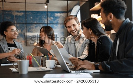 Business team working together on project Royalty-Free Stock Photo #2420005313