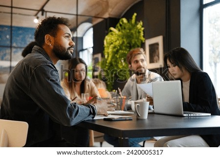 Business team working together on project Royalty-Free Stock Photo #2420005317