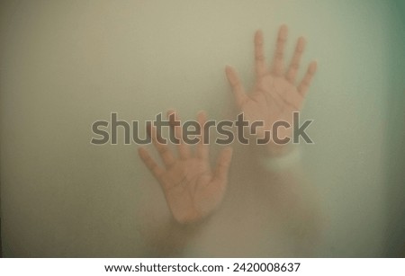 Blurry hand shadow behind mirror, Illustration of designer