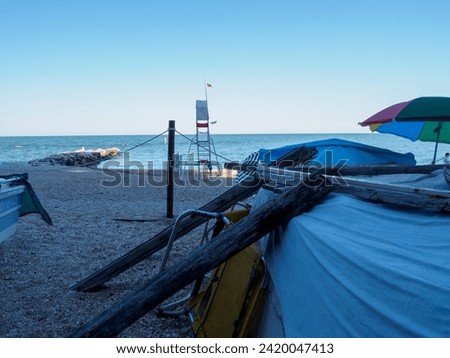 boats on the seand, empty Beach scene in spring time , Adriatic sea in Numana, Le Marche, Italy