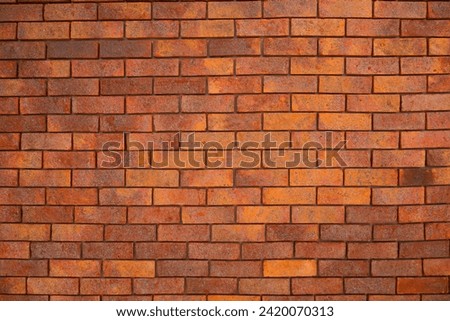 Red Textured Brick Wall Background with Old Cement Blocks and Brown Stone Pattern in Exterior Construction Architecture