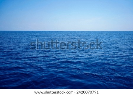 the blue sea is wide and beautiful
