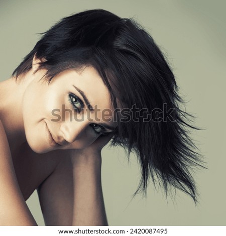 Hair, portrait and woman in studio with shampoo, treatment or haircut results on wall background. Haircare, face and emo female model smile for dye, color or cosmetics, punk rocker or goth aesthetic