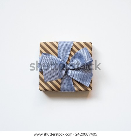 Brown stripe pattern gift box isolated on white background. top view