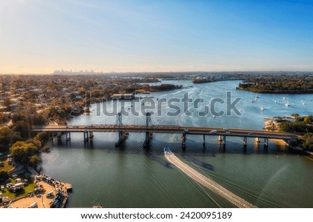 Parramatta river waterway at Ryde bridge of City of Ryde - aerial view towards Sydney city CBD. Royalty-Free Stock Photo #2420095189
