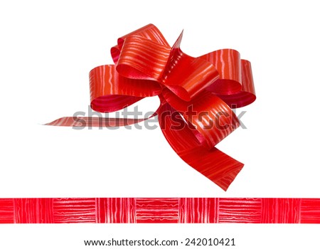 Shiny red satin ribbon on white background
