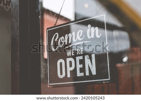 Come in we're open, vintage black retro sign