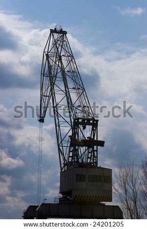 Photo of construction crane and blue sky