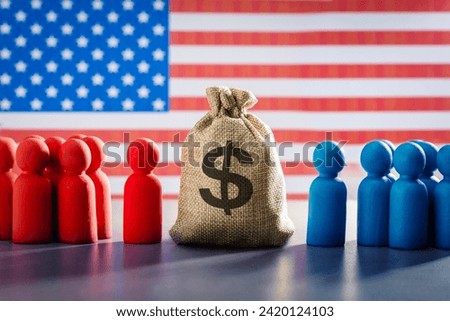 Concept of America budget. Money bag with dollar sign, republicans and democrats political party. The red and blue political parties considering the budget in congress, parliament.
