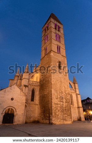 Santa Maria de la Antigua (Old) church in the old town of the city of Valladolid illuminated at night Royalty-Free Stock Photo #2420139117