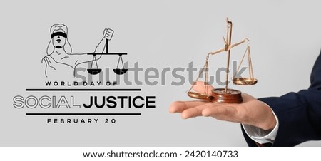 Banner for World Day of Social Justice with lawyer holding scales Royalty-Free Stock Photo #2420140733