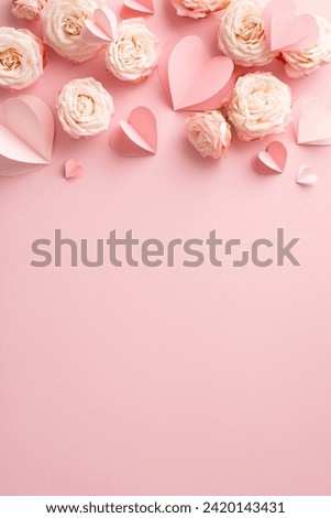 Glam it up for Women's Day with your radiant lady! Top view vertical composition of alluring peony roses and adorable hearts on soft pink backdrop. Stylish canvas for your loving message or promotion